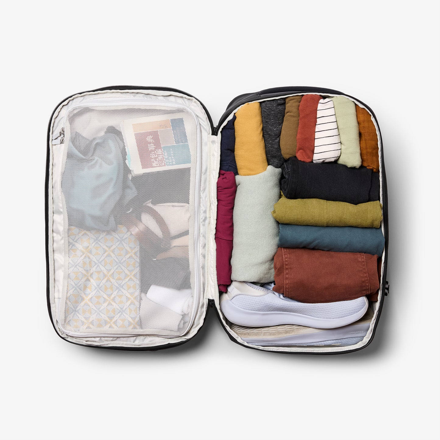 Packs like a suitcase for easy access and organization